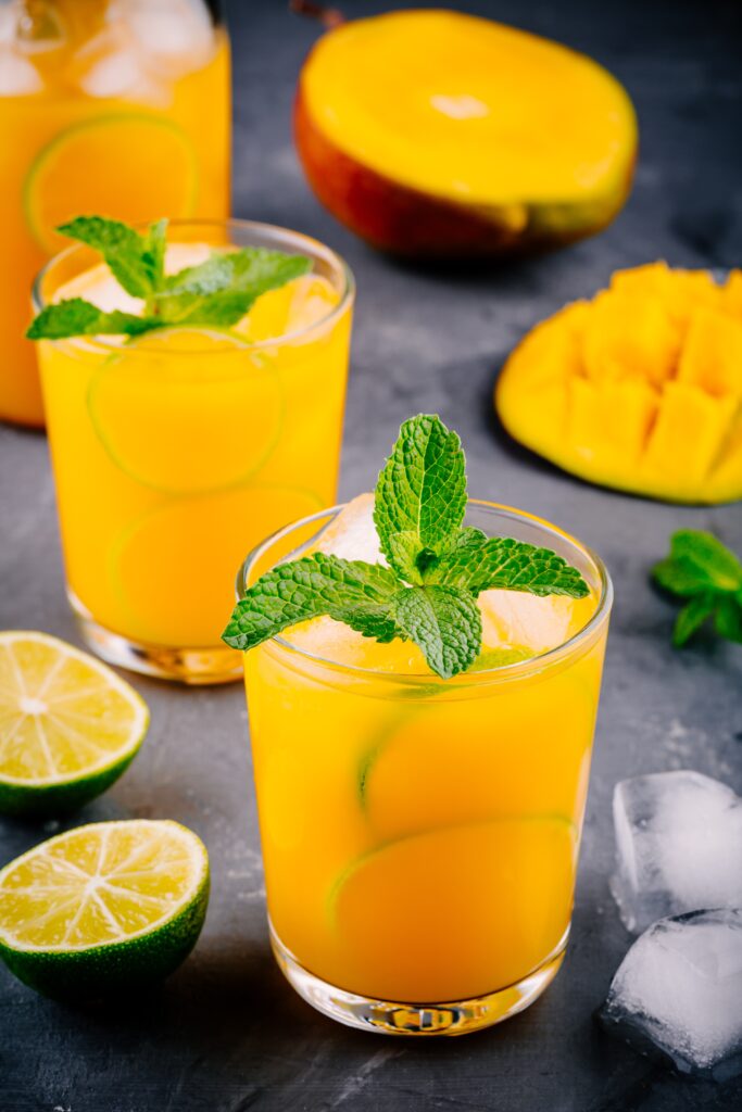 Drinken Mango Hazz med CUBA Mango, friskpresset limesaft og lemon sodavand.